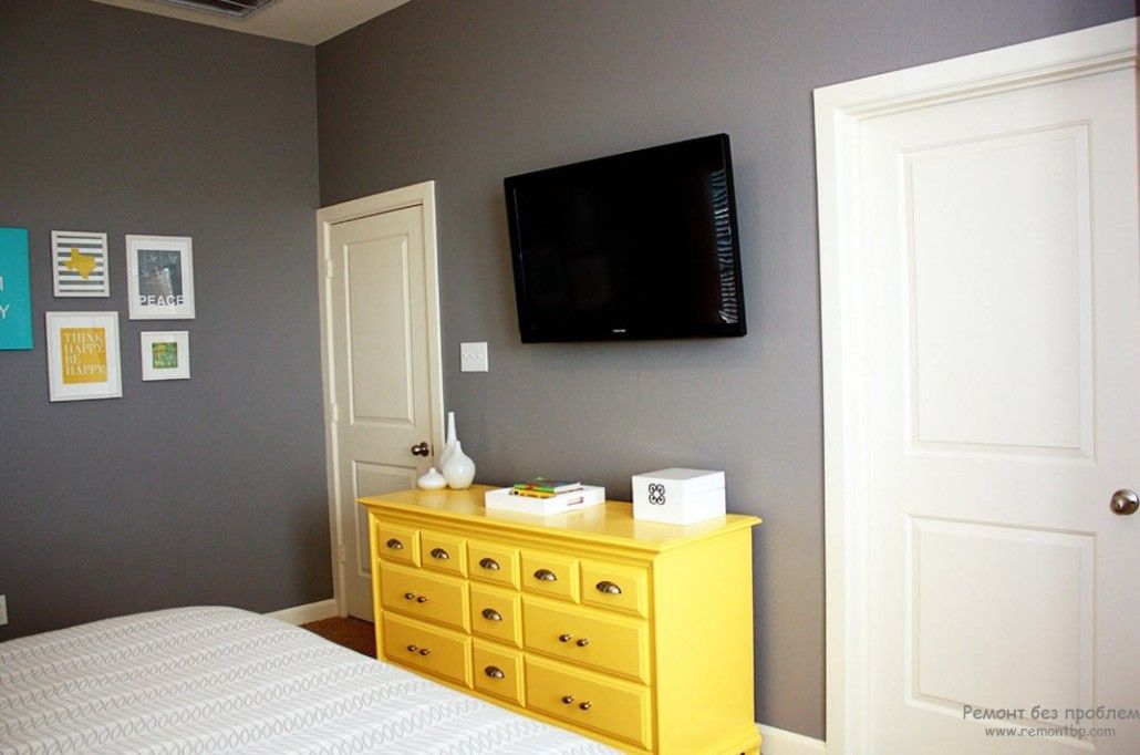 Gray bedroom with vivid yellow Classic cabinet under TV