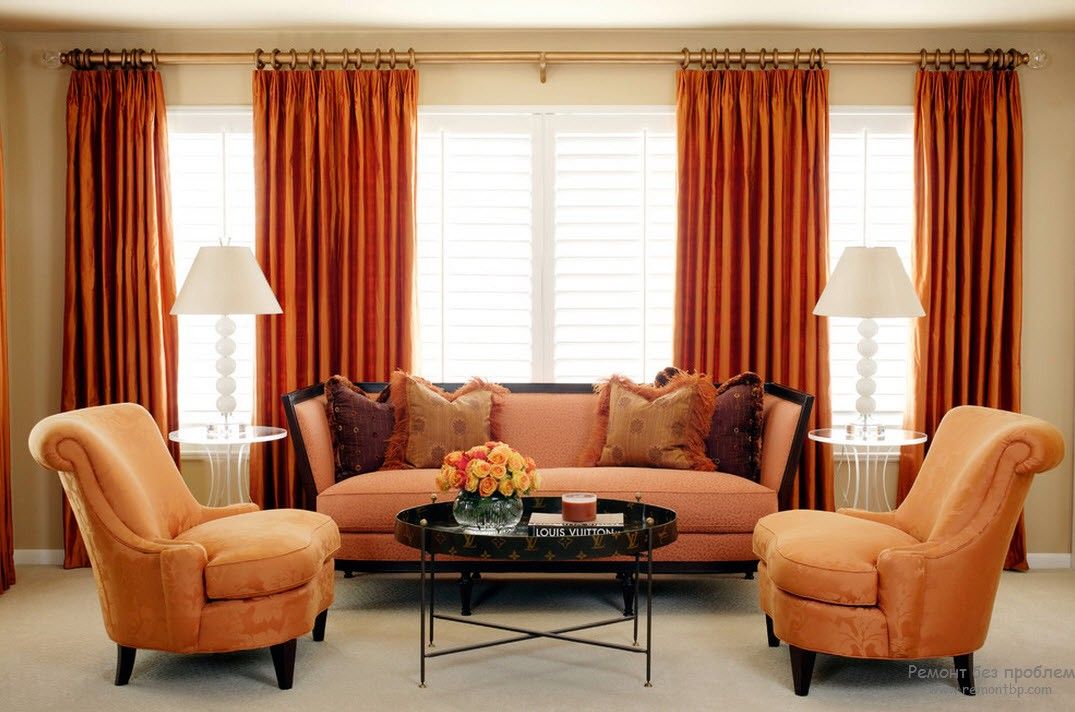 Orange Color Interior Decoration Real Photo Examples. Deep orange curtains and the mild hue of the furniture