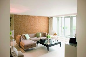 Modern minimalsitic interior with accent cork wallpapere wall