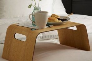 Modern minimalsitic form of the bed tray of wood