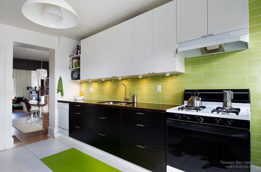 Green LED enlighted backsplash in the hi-tech styled kitchen with dark bottom tier