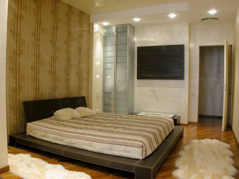 Simple Casual decorated bedroom of 160 square feet with large platform bed