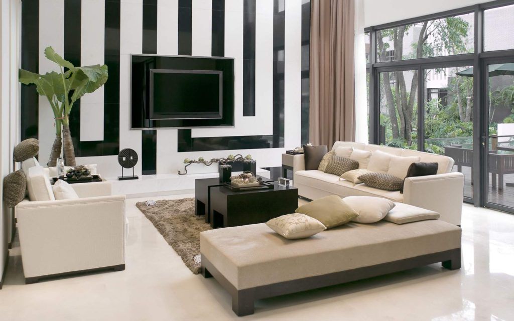 Fabulous black and white striped accent wall with TV-panel