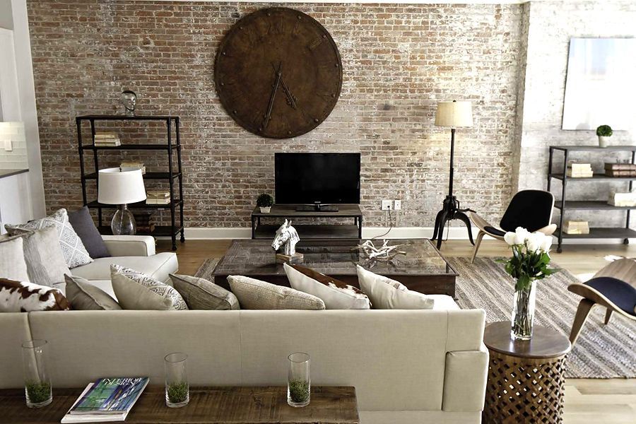 Brickwork and charm of minimalistic style in the large sitting room