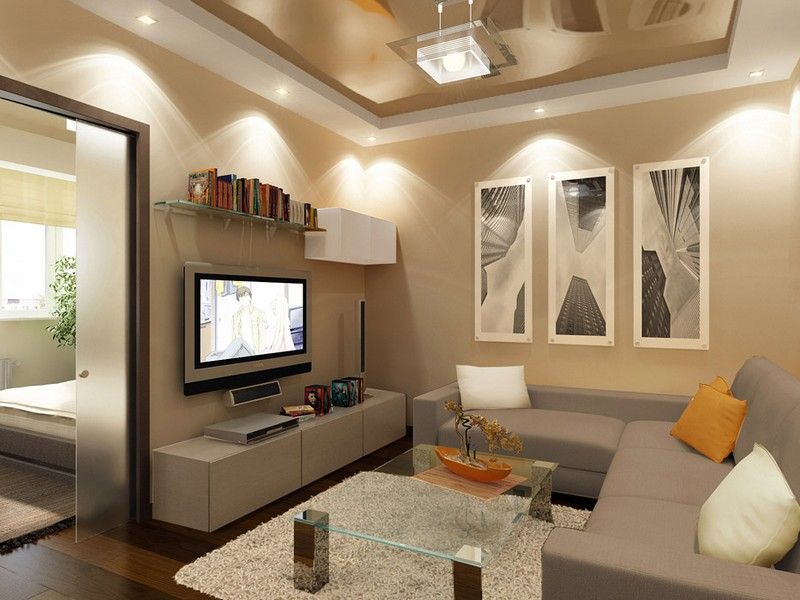 Beige room with pictures and TV-panel