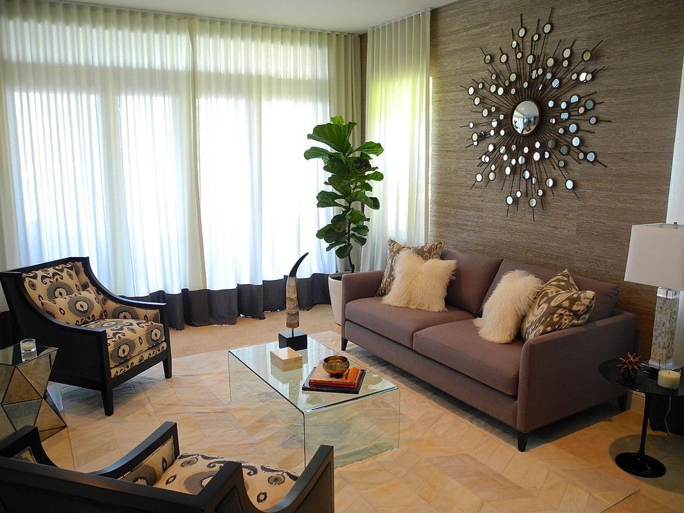 Coffee with milk themed living room and the modern styled interior with sunburst decoration at the wall