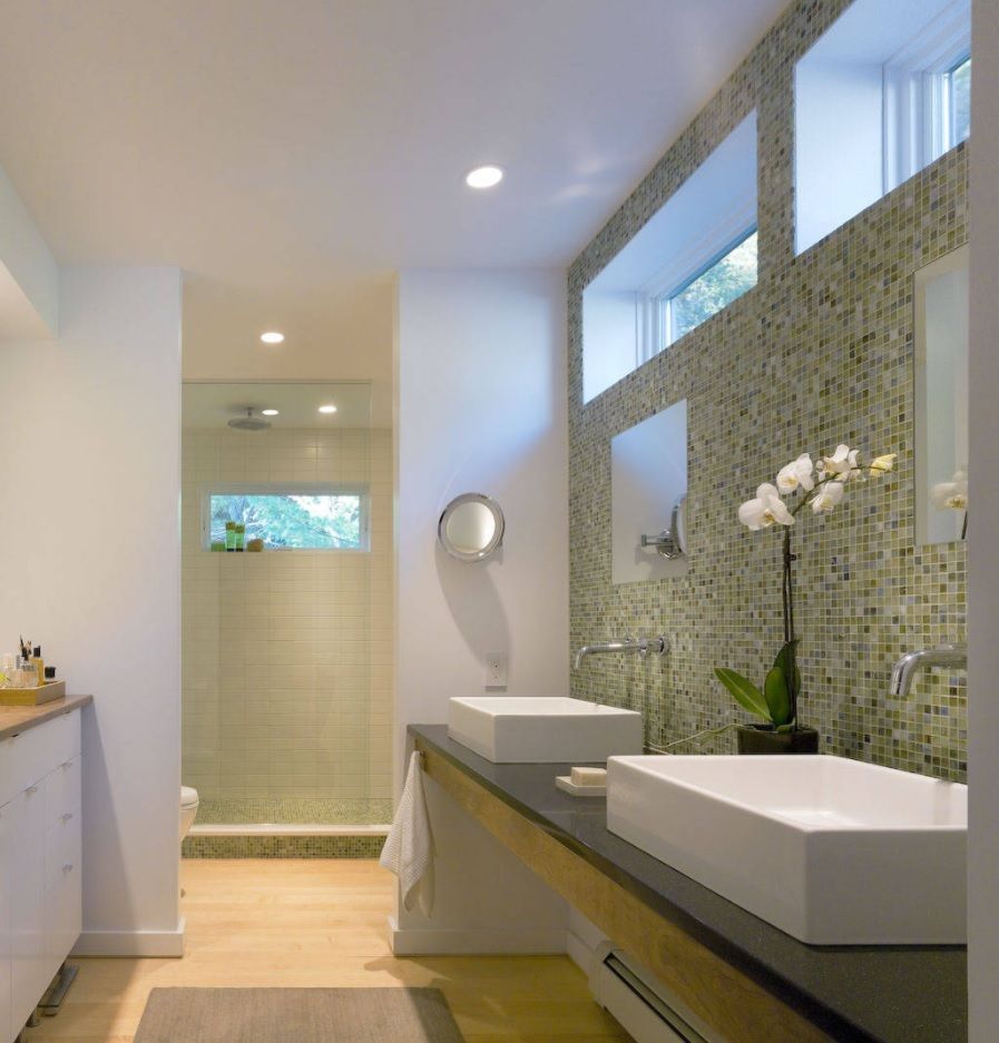 Jack and Jill Bathroom Interior Design Ideas. Top windows and accent mosaic wall in the white matted atmosphere