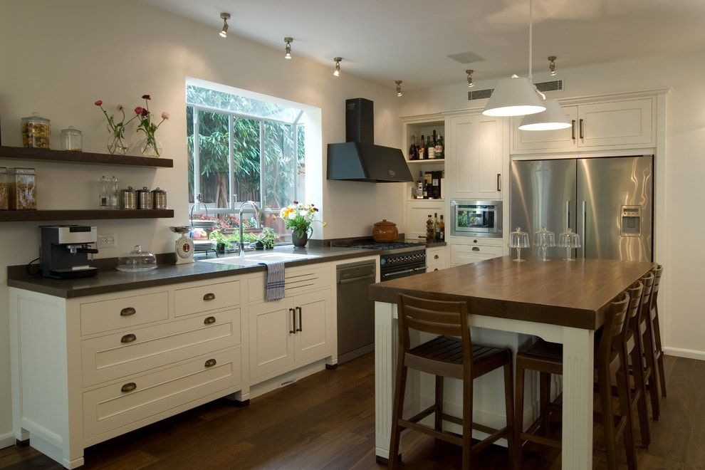Suburb cottage kitchen interior with black extractor hood