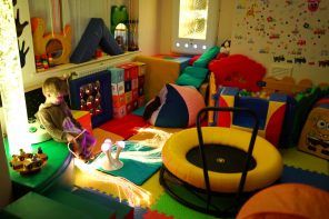 Sensory room idea for children with autism full of soft toys and furniture