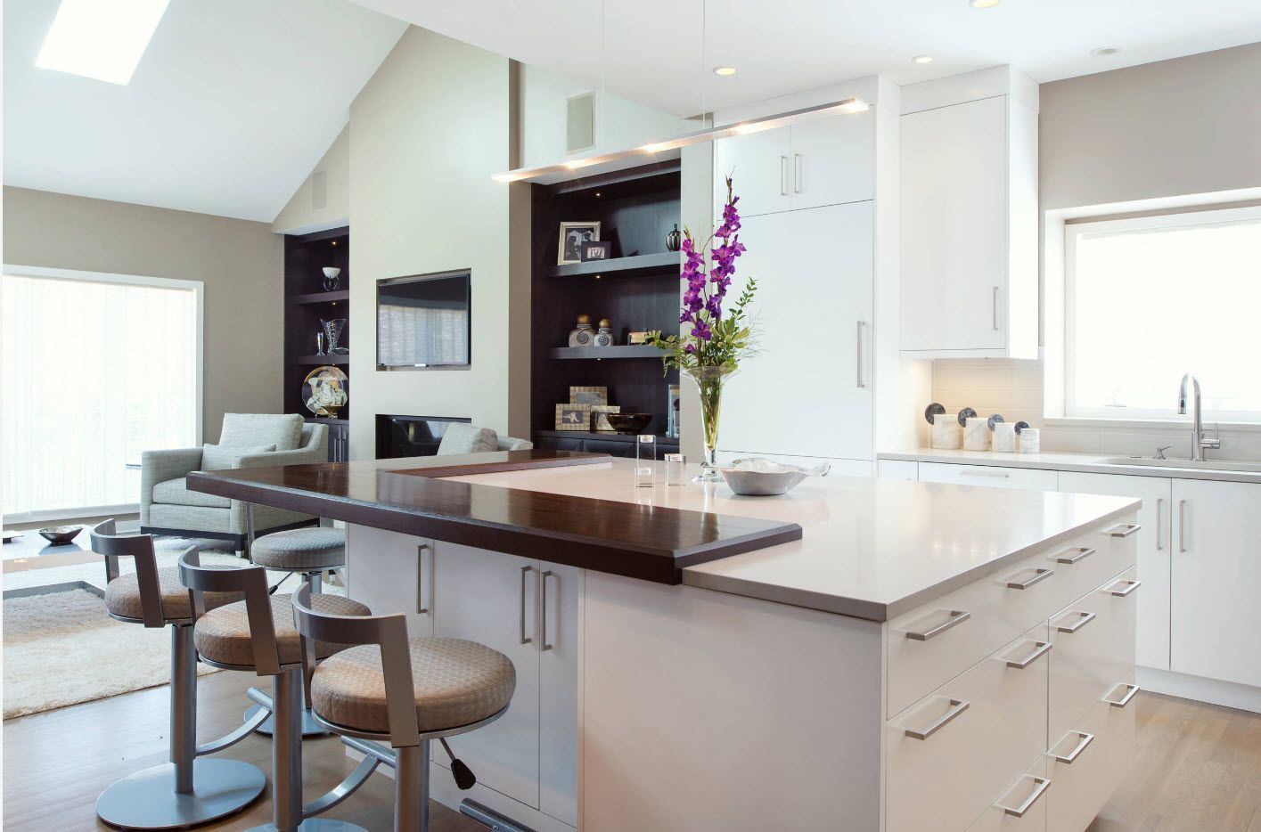 Loft and hi-tech combination of styles for the open layout kitchen with large island