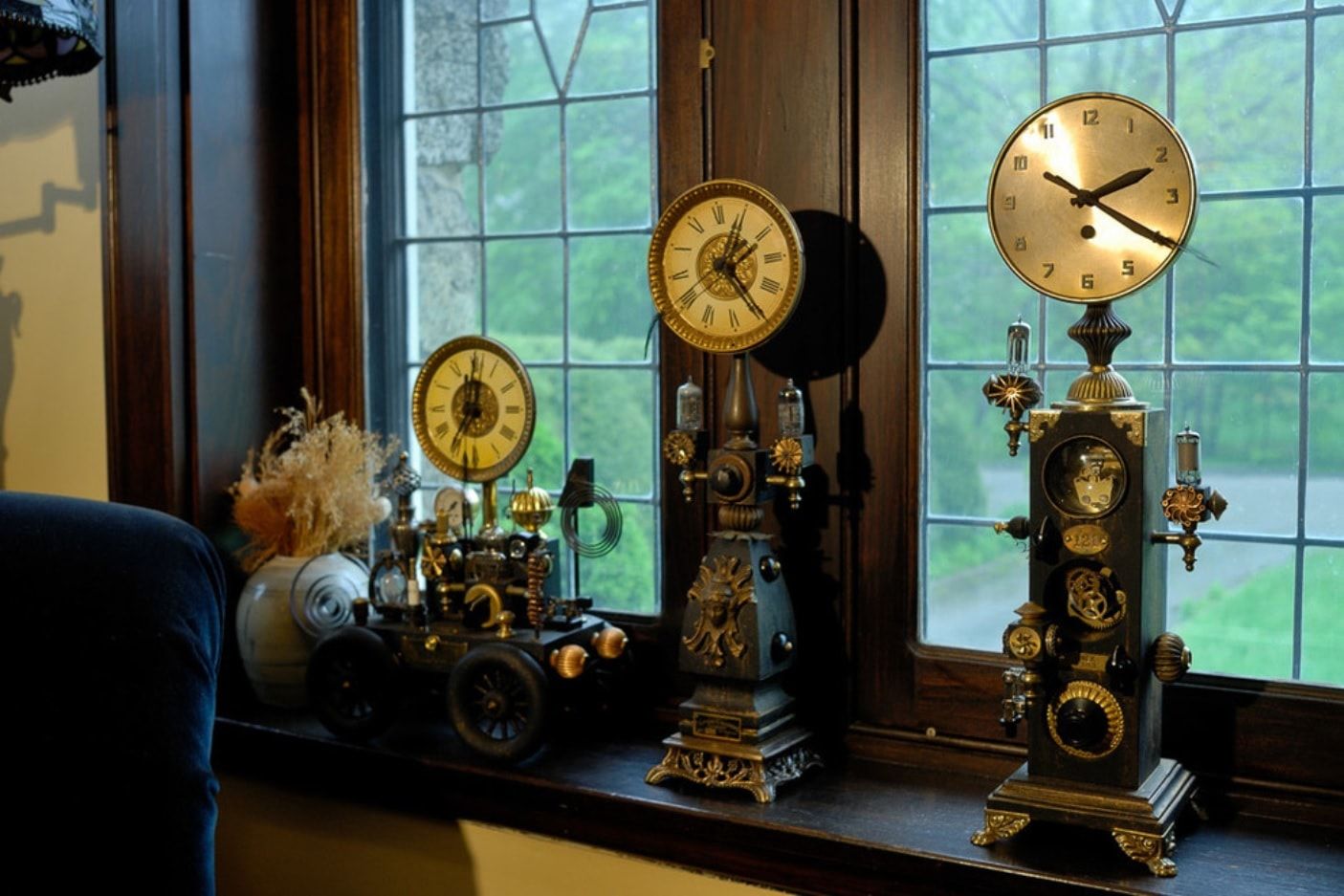 Modern Steampunk House Interior Photo Examples. Rare clocks of the latticed window sill