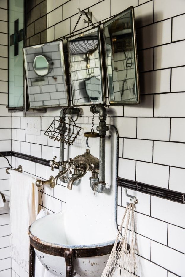 Extreme design for the bathroom with underground tile and classic chrome tap