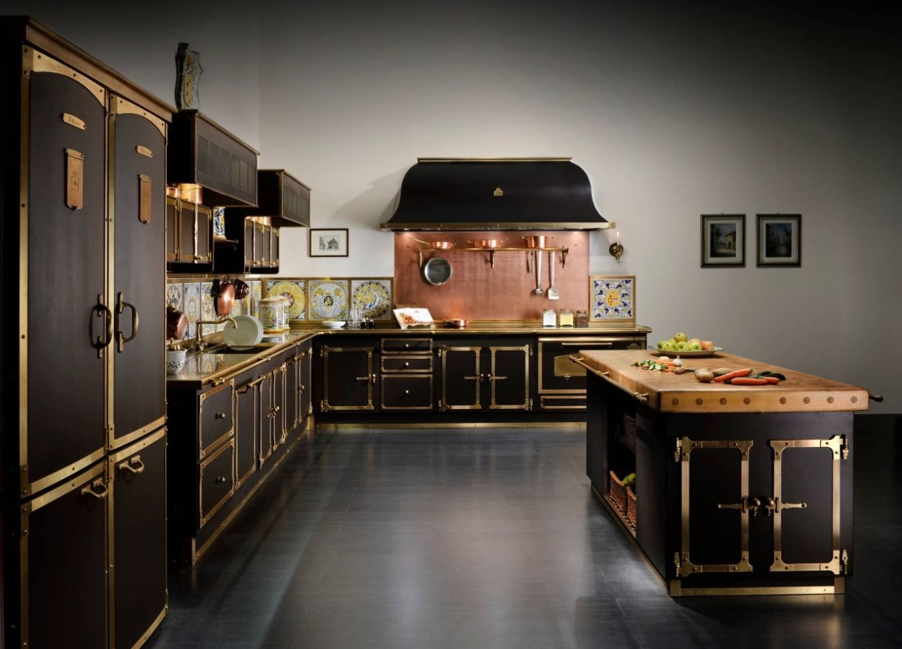 Dark kitchen design with golden fittings and ornament on facades