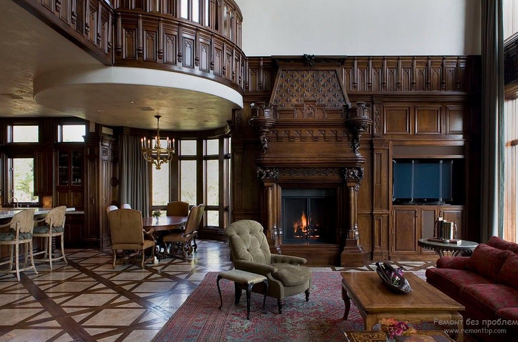 Two-level open space room with massive carvings of noble dark wood