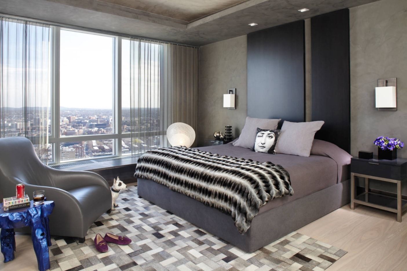 Modern Interior Design Style. Gray shades and zebra coverlet add noble look to the crisp lined design of the modern bedroom