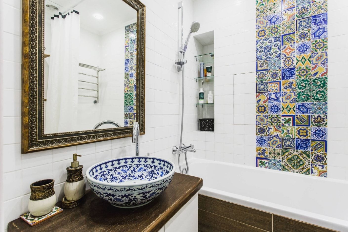 Painted blue sink and Zeinah mosaic tiles for accent in the bathroom