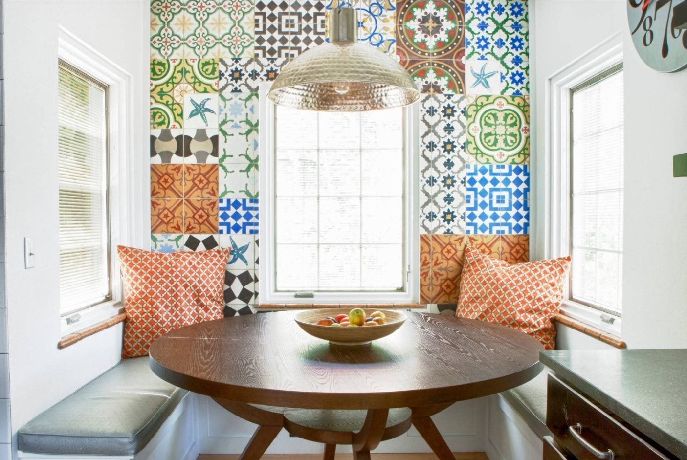 Colorful painted Moroccan tiles to make small dining area cute and fanciful