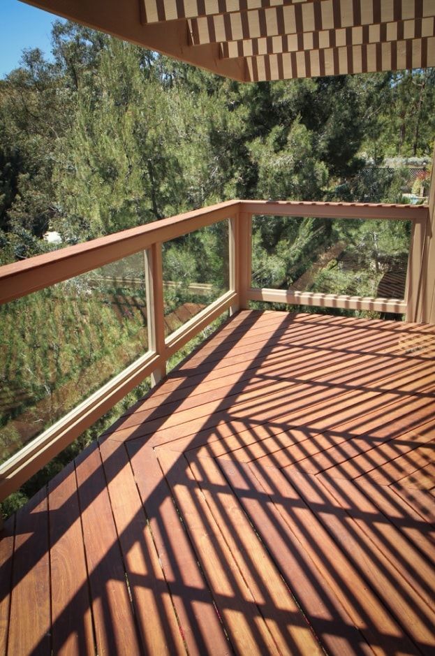 Fully wooden balcony platform with glass inserts