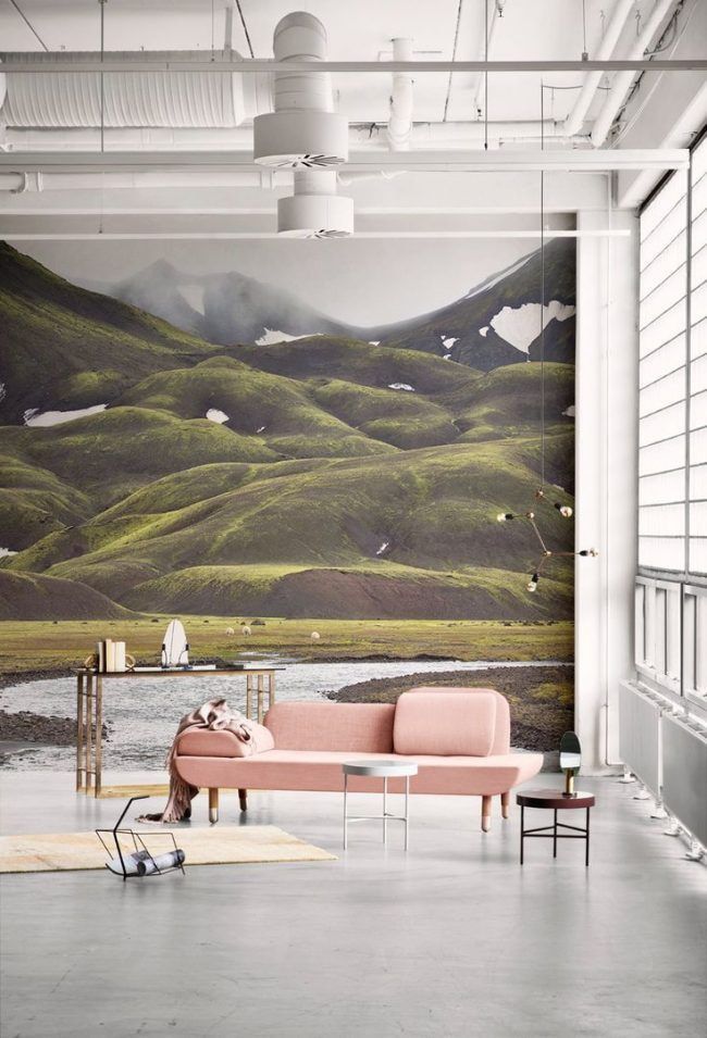 Mountain ranges at the wall of large living room 