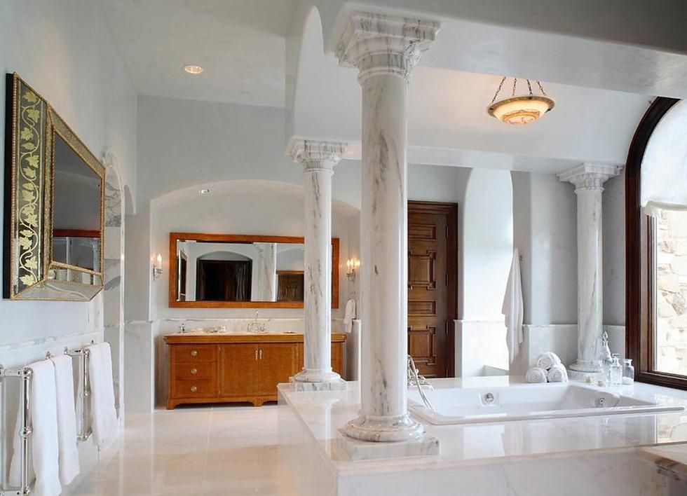 Sophisticated Luxury and Refinement. Antique marble columns for chic bathroom