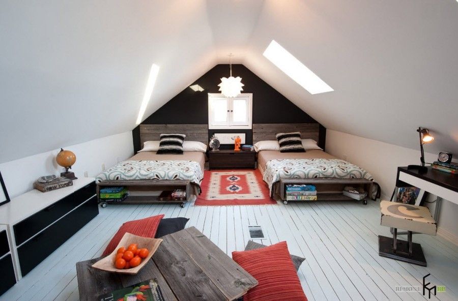 Nice white decorated room with accentual black headboard wall and small playground