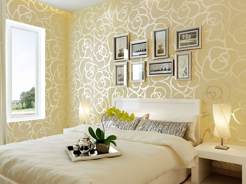 Intimately highlighted silk structure of the wallpaper in the bedroom