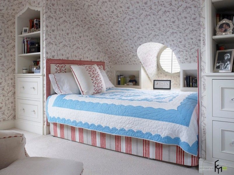 Unusual round window right at the bedside in Classic styled room