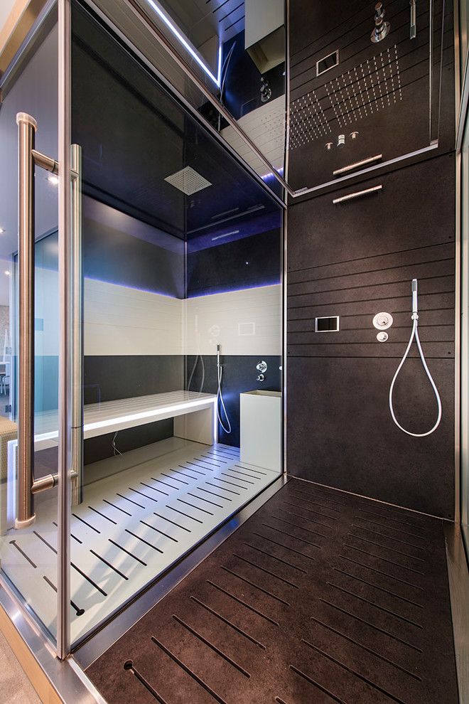 Gorgeous modern bathroom design with shower zone and mirror ceiling