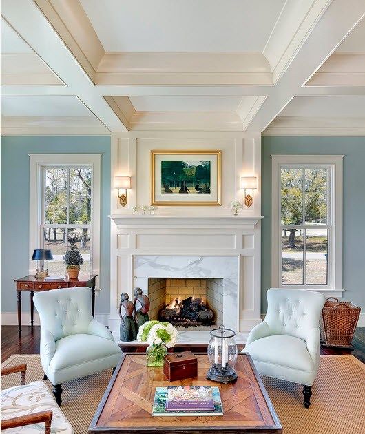 Square ceiling structure and the fireplace for neat Classic styled living room