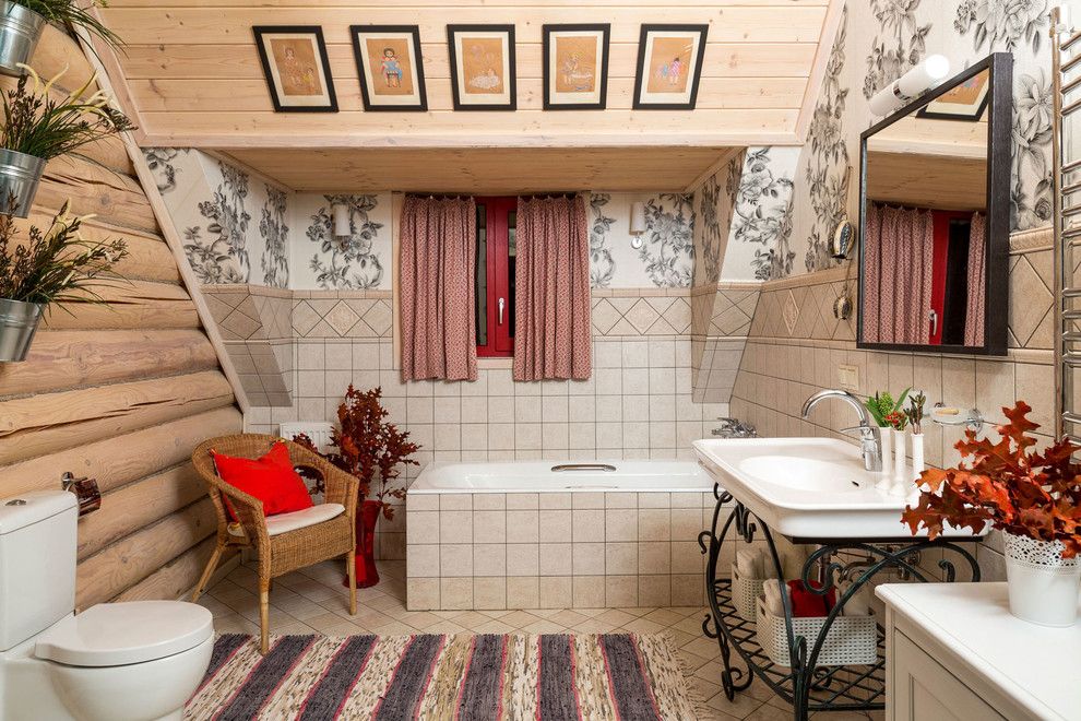Unusual bathroom at the loft floor with neat color theme and wooden chair