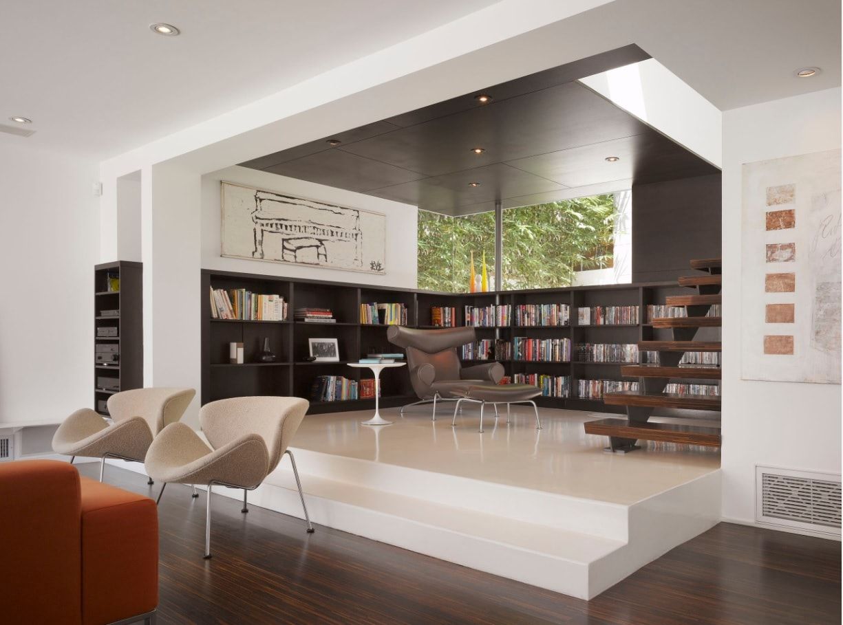 Podium library zone in large open space apartment