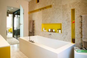 Niche in the Room: Recess in the Wall for Decoration and Functionality. Yellow inlays in the modern bathroom for different trifles