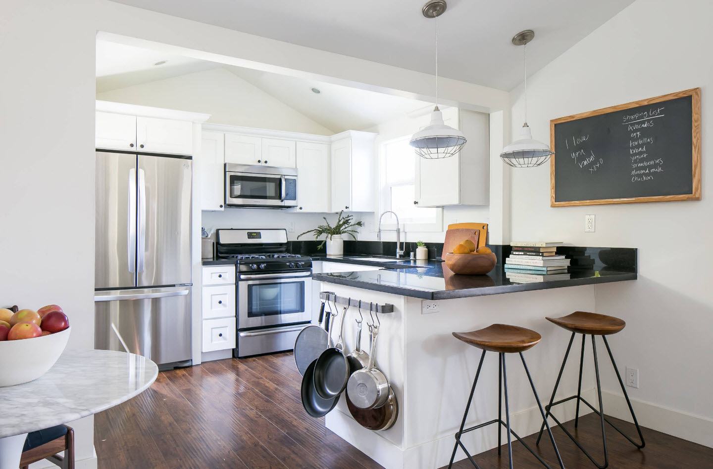 120 Square Feet Kitchen Interior Design Ideas with Photos. White trimmed walls and dark wooden floor