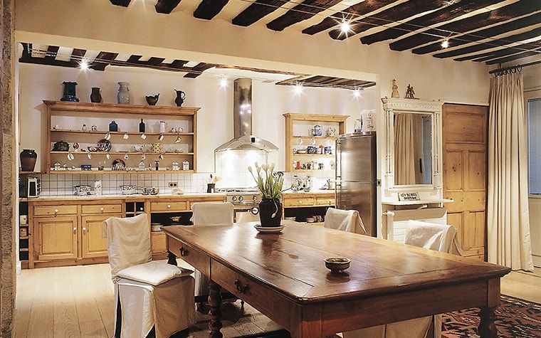 Italian Dining Room & Kitchen Combined in One Space. The piano keys looking ceiling with exposed beams and ivory tint of the interior color scheme