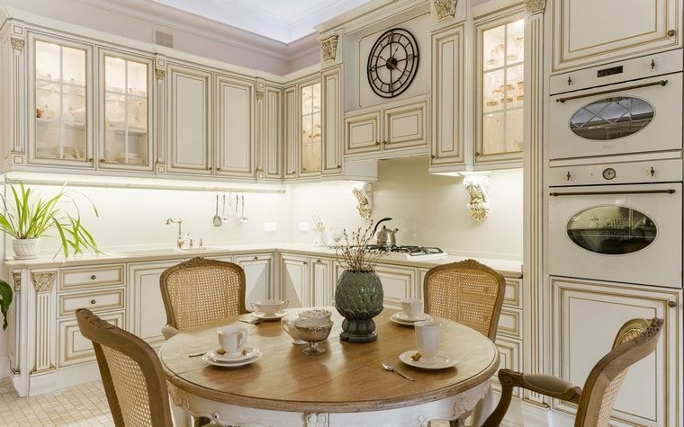 Italian Dining Room & Kitchen Combined in One Space. Ethnic designed kitchen with modern backlight of the countertop