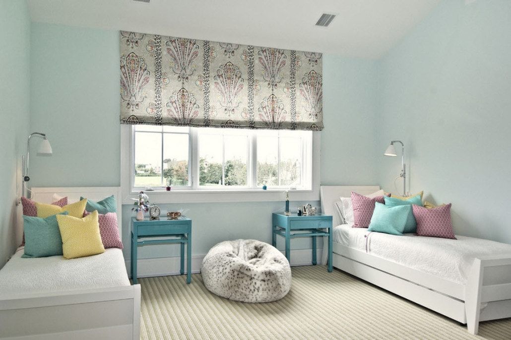 Pale blue walls for modern styled children's room for two