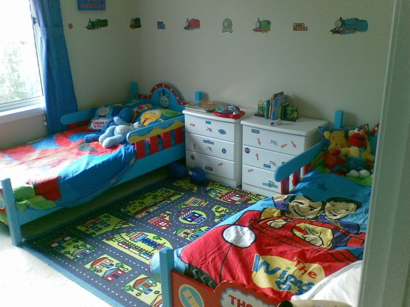Zoning of the Children's Room Ideas. Unusual decorative rug in the room for two kids