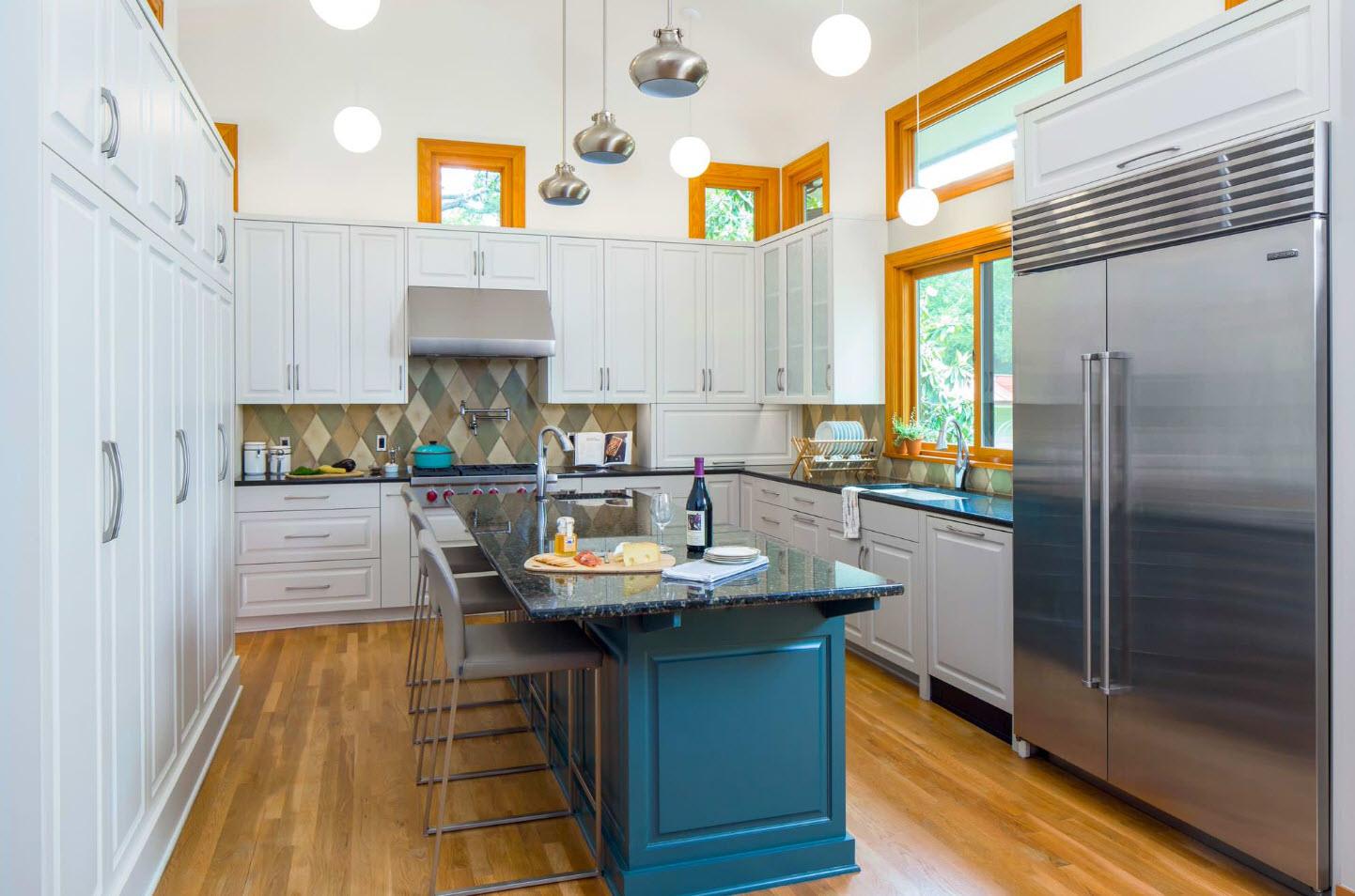 Large modern kitchen with navy blue island