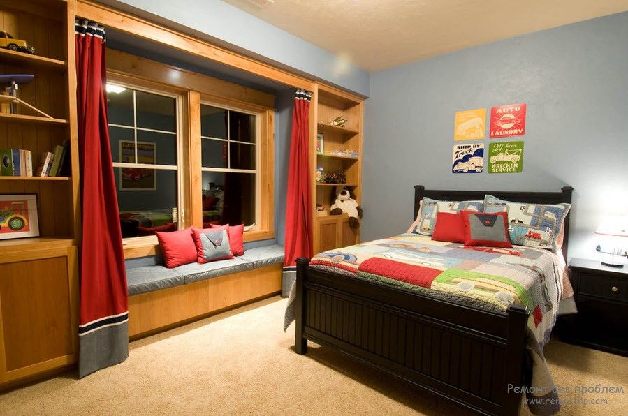 Curtains in the Interior of the Children’s Room. Modern designed room with sleeper at the large wooden window