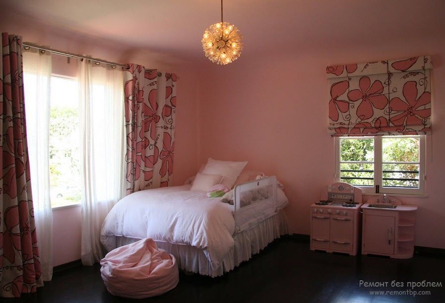 Curtains in the Interior of the Children’s Room. Small room with pink walls