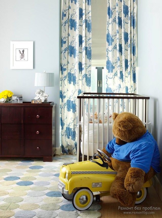 Curtains in the Interior of the Children’s Room. Dotted curtains and the teddy-bear in toy car