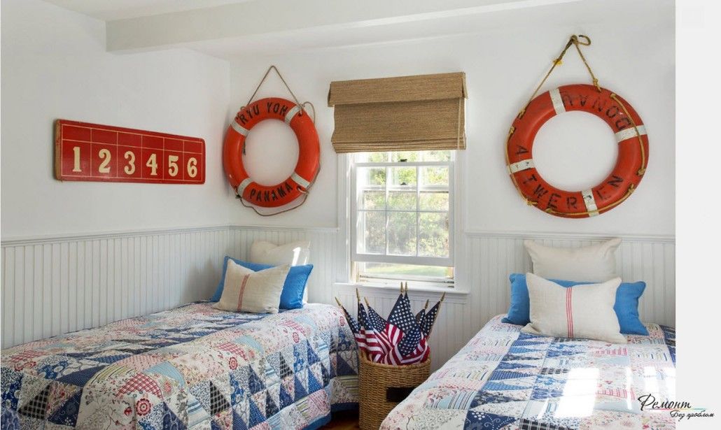 Marine styled room for children with lifebuoys as the decoration