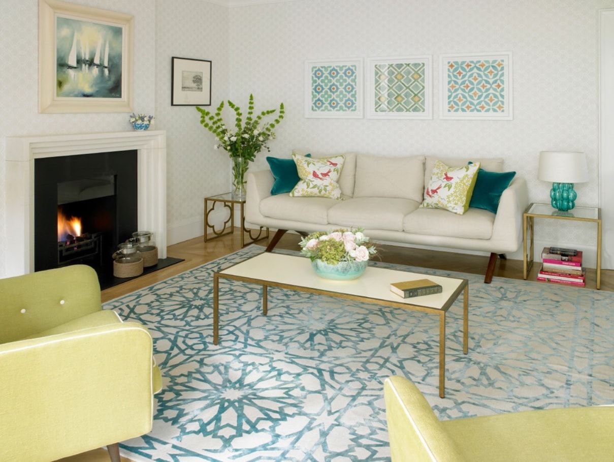 Drawing Room Interior Design in Different Living Spaces and Styles. Yellow furniture and blue pattern on the carpet for the room