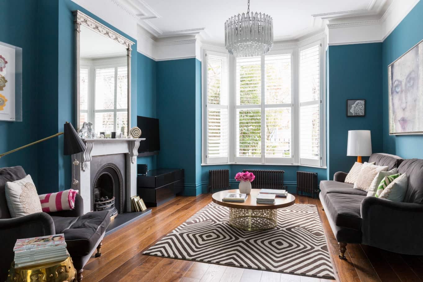 Bay window and blue wall paint for vintage styled living room