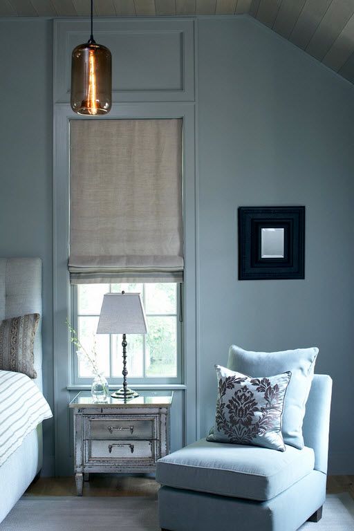 Blue designed Classic bedroom with lots of pillows