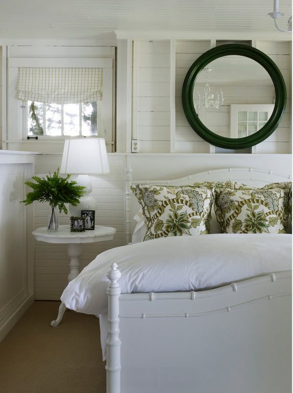 Round mirror and the bedside table for small bedroom