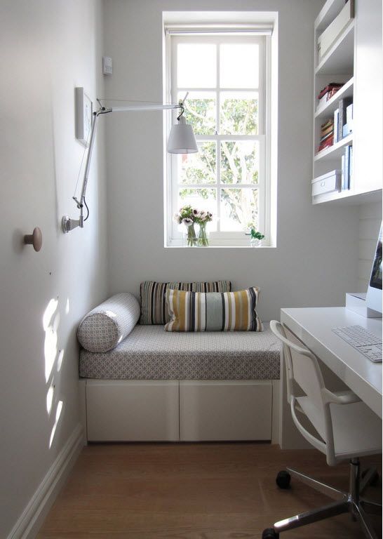 Gray color theme for small nook with sleeper at the window and pendant lamp