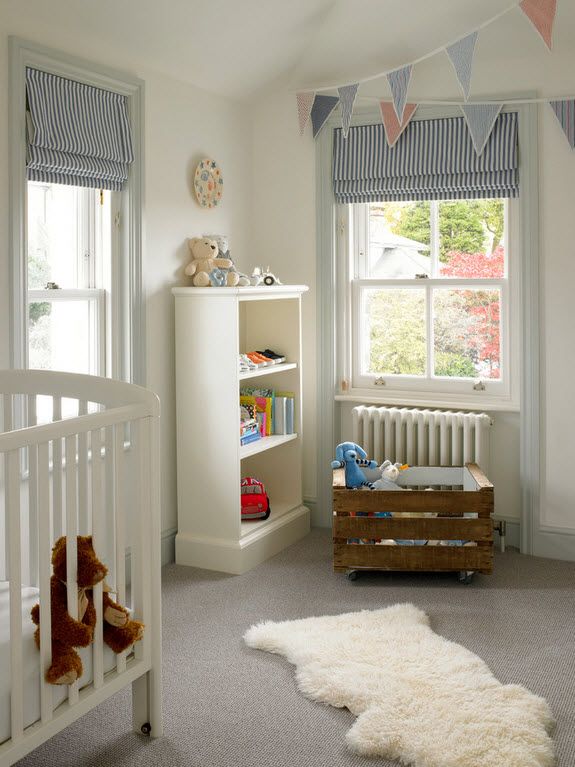 Children's room with the crib and open cabinet in white matte paint