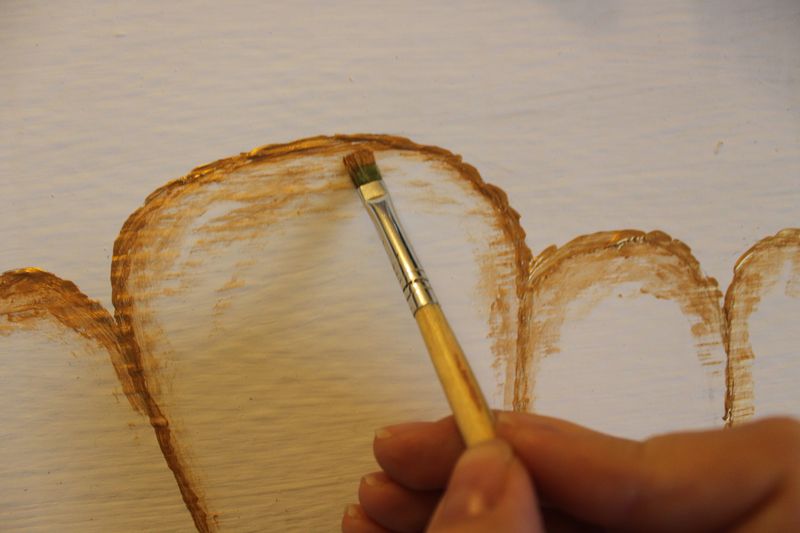 Painting the drawing with tassel