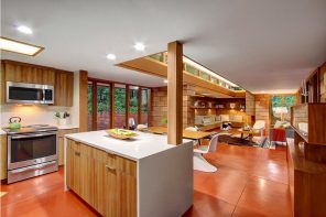 Original Country House Design in Red Color. Kitchen island at the open space cooking area